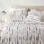 Amazon Basics - Set copripiumino in rasatello, 155 x 200 cm / 80 x 80 cm x 2
